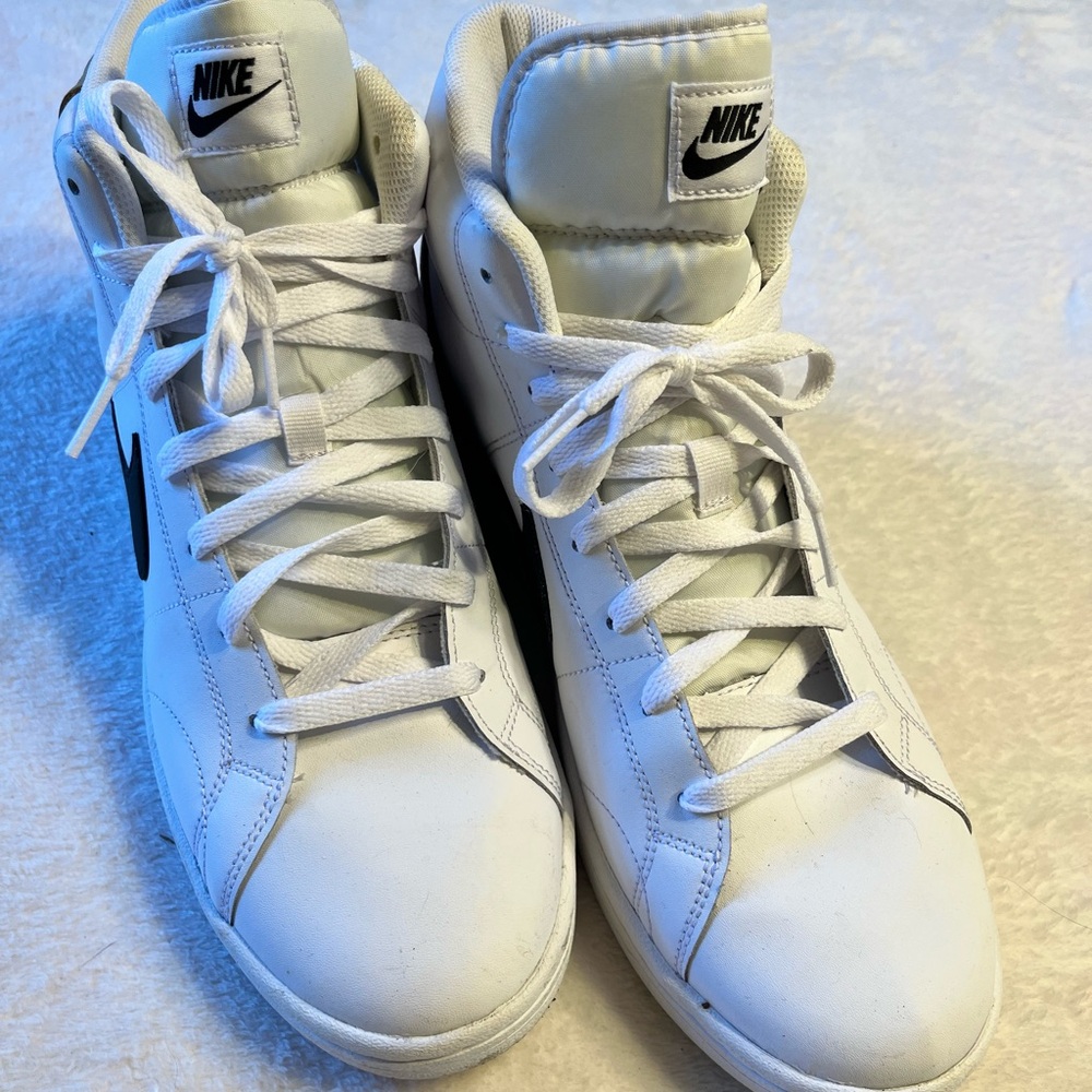 Nike White High-Top Sneakers with Black Swoosh Accent